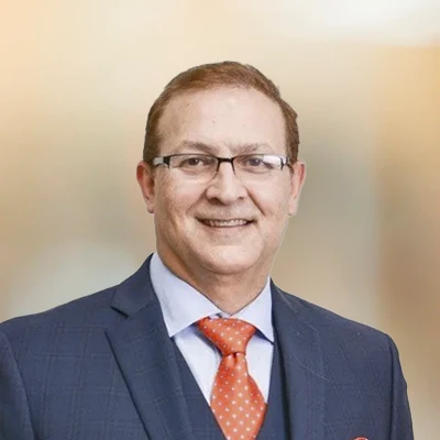 A headshot of Dr. Richard Romay, a dentist at Design A Smile.